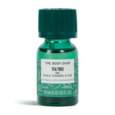 The Body Shop Tea Tree Oil bottle closeup showing purifying care for oily skin.