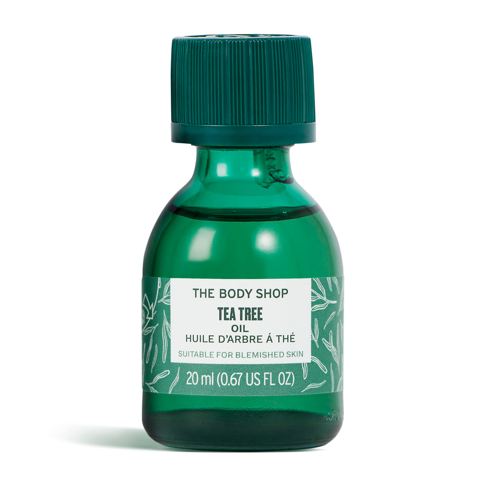 The Body Shop Tea Tree Oil bottle close-up illustrating purifying action for blemish-prone skin