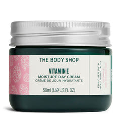The Body Shop Vitamin E Moisture Cream jar close-up shows lightweight hydration for dehydrated skin