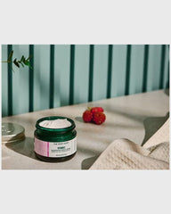 The Body Shop Vitamin E Night Cream packaging with recycled glass highlights sustainable design.