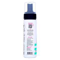 The Doux curl-definition closeup highlights bouncy, defined texture on curls.