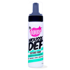 The Doux multi-use mousse bottle closeup shows one-step curl definition and shine.