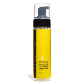 The Hair Diagram Ashley Marie Styling Mousse bottle demonstrates frizz control and lightweight hold.