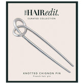 The Hair Edit knotted chignon pin hero showing matte silver finish for an elegant, secure updo