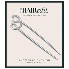 The Hair Edit knotted chignon pin hero showing matte silver finish for an elegant, secure updo