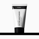 The INKEY List Peptide Moisturizer jar closeup demonstrates hydrating, dry-skin care.