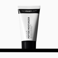 The INKEY List Peptide Moisturizer jar closeup demonstrates hydrating, dry-skin care.