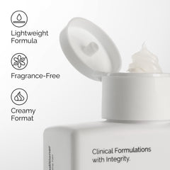 The Ordinary creamy conditioner texture on fingers, demonstrates lightweight slip and spreadability