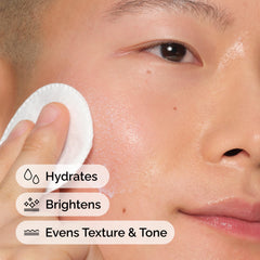 Hand holding The Ordinary toner bottle to show scale and easy application benefit