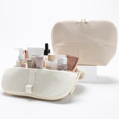 THE VERTI fold-down design close-up illustrates quick touch-ups at hotels.