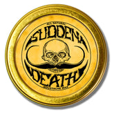 The Vintage Grooming Co Sudden Death moustache wax tin in focus, delivering strong hold for styled facial hair.