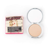 theBalm Mary-Lou Manizer compact close-up highlighting champagne glow for on-the-go radiance
