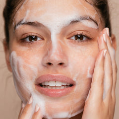 The Face Shop packaging front showing White Seed Exfoliating Cleansing Foam with no animal-derived ingredients.