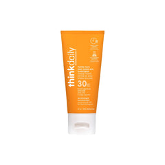 Thinkdaily SPF 30 tinted sunscreen bottle showing natural tint for all skin tones.