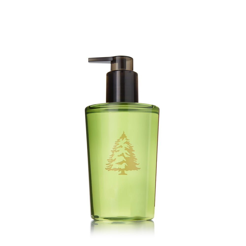 Thymes Frasier Fir handwash bottle showcases crisp forest scent and hydrating wash.