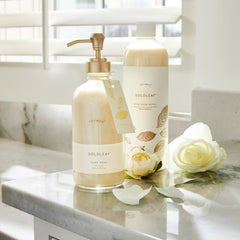Thymes Goldleaf glass bottle on countertop showcases artisan design and decor value.