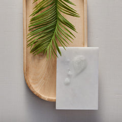 Thymes hand wash bottle being poured to highlight easy rinse and light lather.