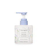 Thymes Replenishing Hand Lotion bottle featuring lavender scent and soothing moisture.