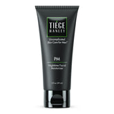 Tiege Hanley face moisturizer bottle close-up for nighttime hydration and skin nourishment.