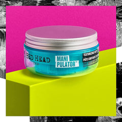 TIGI Bed Head Manipulator hands applying product for texture and control