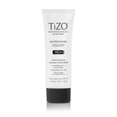 TIZO AM Replenish SPF 40 bottle closeup showing light tinted cream for daily protection