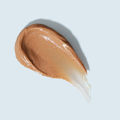 TiZO Lip Protection tinted balm being applied on lips for color and protection