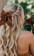 Tobeffect ponytail-wear shows quick, polished style with satin bows.