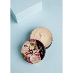 TOKYOMILK Dead Sexy Parfum Crema bottle pour reveals warm vanilla and exotic wood notes for all-day allure.