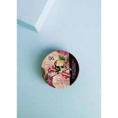 TOKYOMILK Dead Sexy Parfum Crema fragrance-note-visual highlights vanilla, orchid, and ebony wood.