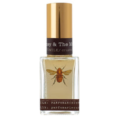 TOKYOMILK Honey & The Moon bottle closeup demonstrates premium packaging for daily elegance.