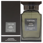 Tom Ford Oud Wood bottle-front features refined oriental woody fragrance for all occasions.