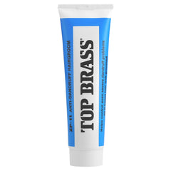 Top Brass anti-dandruff hair cream bottle for daily scalp care.