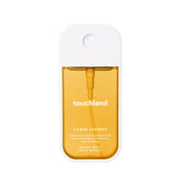 Touchland Mango Mojo bottle front view, hydrating body mist.