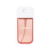 Touchland Peachy Lychee mist bottle showcases travel-friendly packaging for on-the-go freshness.