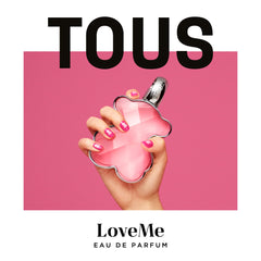 TOUS LoveMe bottle on desk conveys modern elegance for everyday wear.