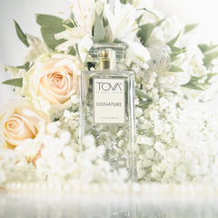 Tova Signature bottle sideview showcases elegant silhouette for classy evening wear and confidence