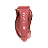 Tower 28 LipSoftie Red Bean Mochi lip balm tube delivering hydration.
