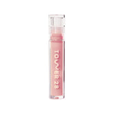 Tower 28 ShineOn Milky Lip Jelly bottle closeup for smooth hydration on lips.