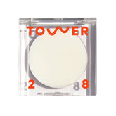 Tower 28 SuperDew balm packaging close-up for easy touch-up glow.