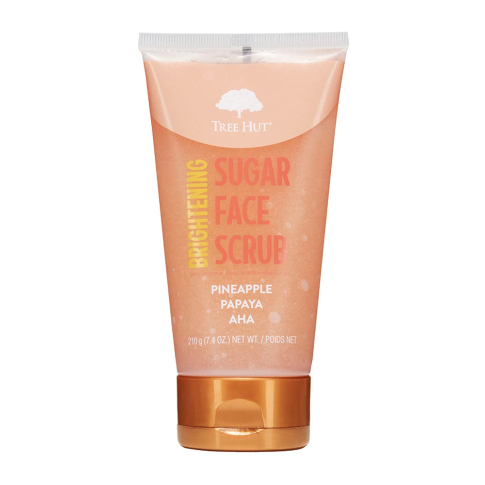 Tree Hut Pineapple & Papaya Face Scrub packaging showcases vibrant formula for brightening skin.