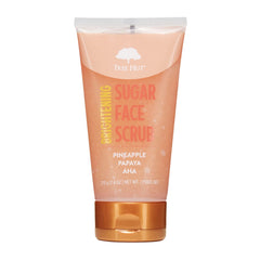 Tree Hut Pineapple & Papaya Face Scrub packaging showcases vibrant formula for brightening skin.