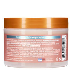 Tree Hut vitamin c whipped shea body butter being applied to forearm