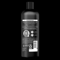 Close-up of creamy lather from TRESemmé Moisture Rich Shampoo for daily softness.
