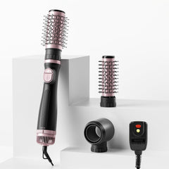 Tresses Touch blow dryer brush front view showing compact ergonomic handle for easy styling.