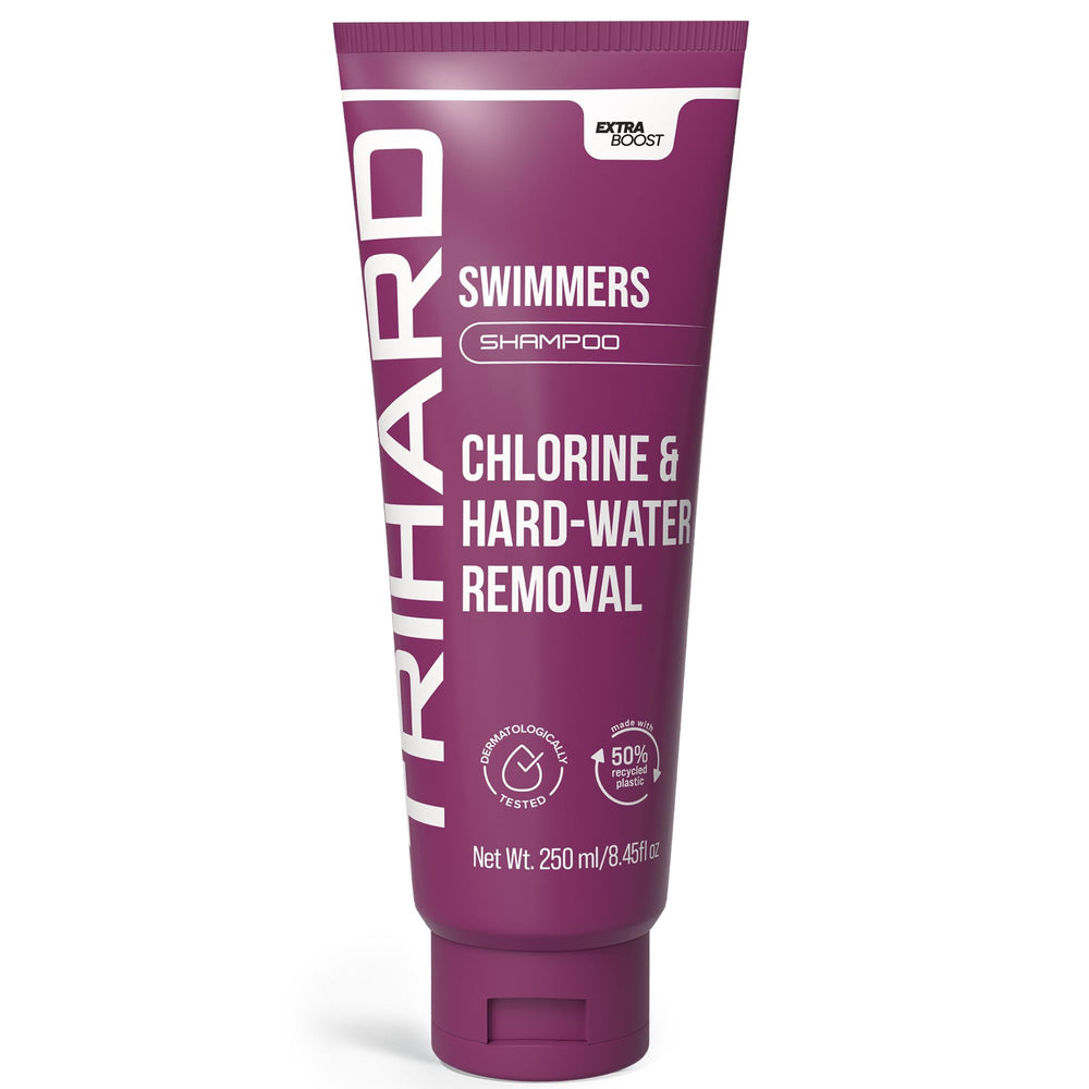 TRIHARD Swim Shampoo bottle by the pool for post-swim hydration.