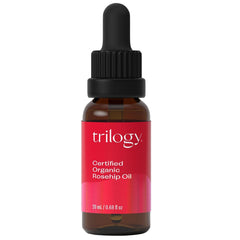 Trilogy Rosehip Oil bottle with dropper for precise nourishing application.