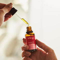 Trilogy Rosehip Oil Antioxidant+ rosapene-blend ingredients scene emphasizing antioxidant benefits.
