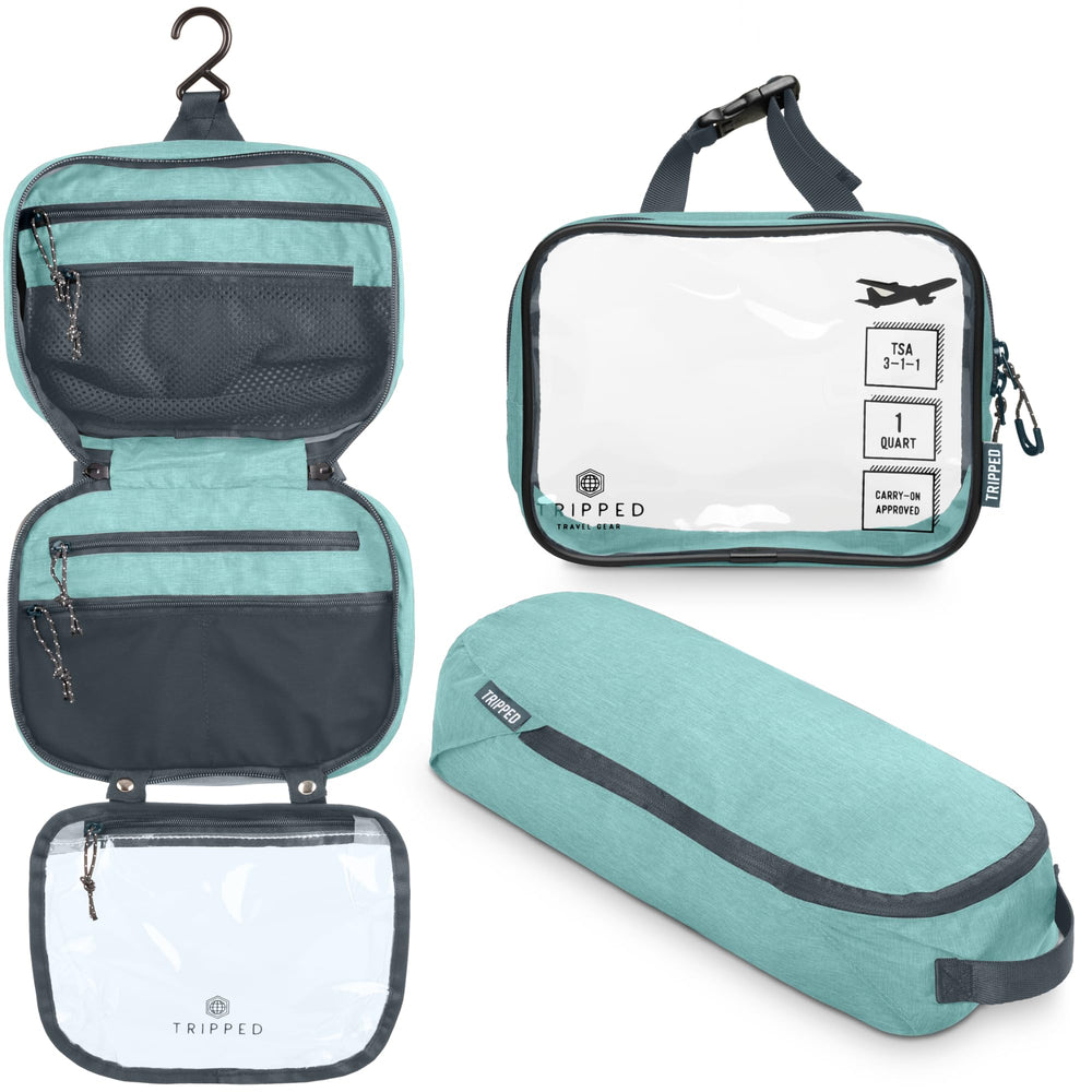 TRIPPED Toiletry Bag Hanging in dusty teal with organized compartments for easy travel.