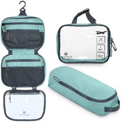 TRIPPED Toiletry Bag Hanging in dusty teal with organized compartments for easy travel.