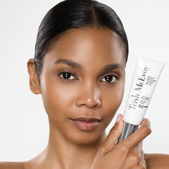 Texture close-up of Trish McEvoy Protective Shield Cream shows creamy primer feel on skin.
